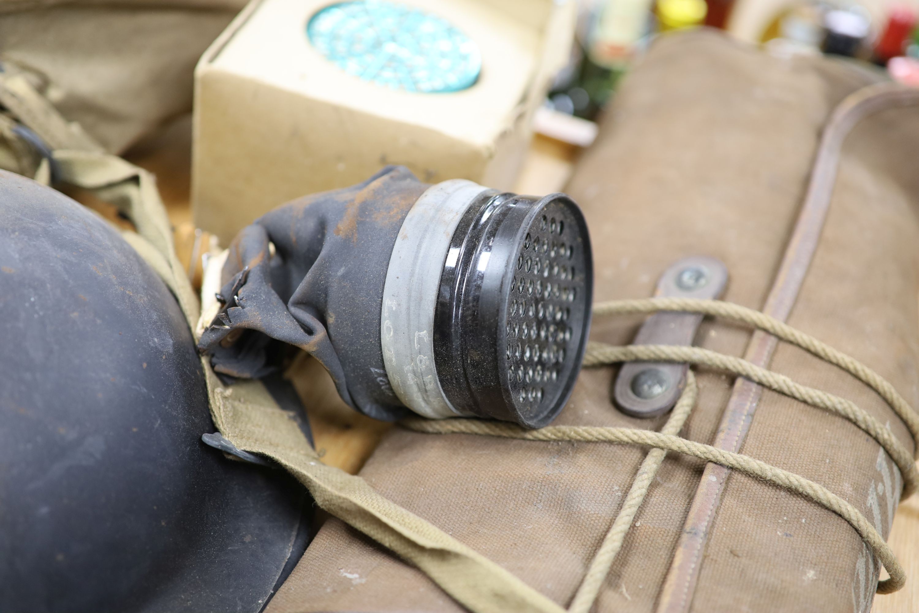 Two WWII air wardens helmets, and other WWII ephemera